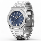 Silver watch with blue dial on a white background