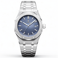 Silver watch with blue face on a white background